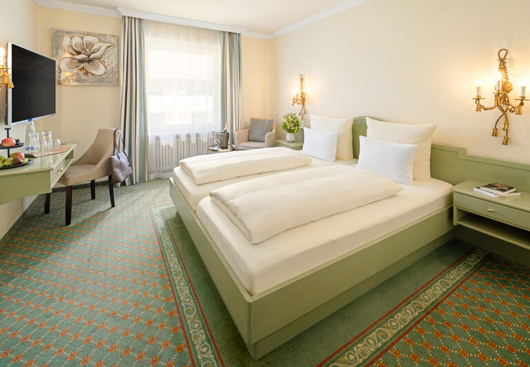 Gemütliches Komfort-Zimmer des Dreiflüssehofs in Passau mit einladender Atmosphäre.